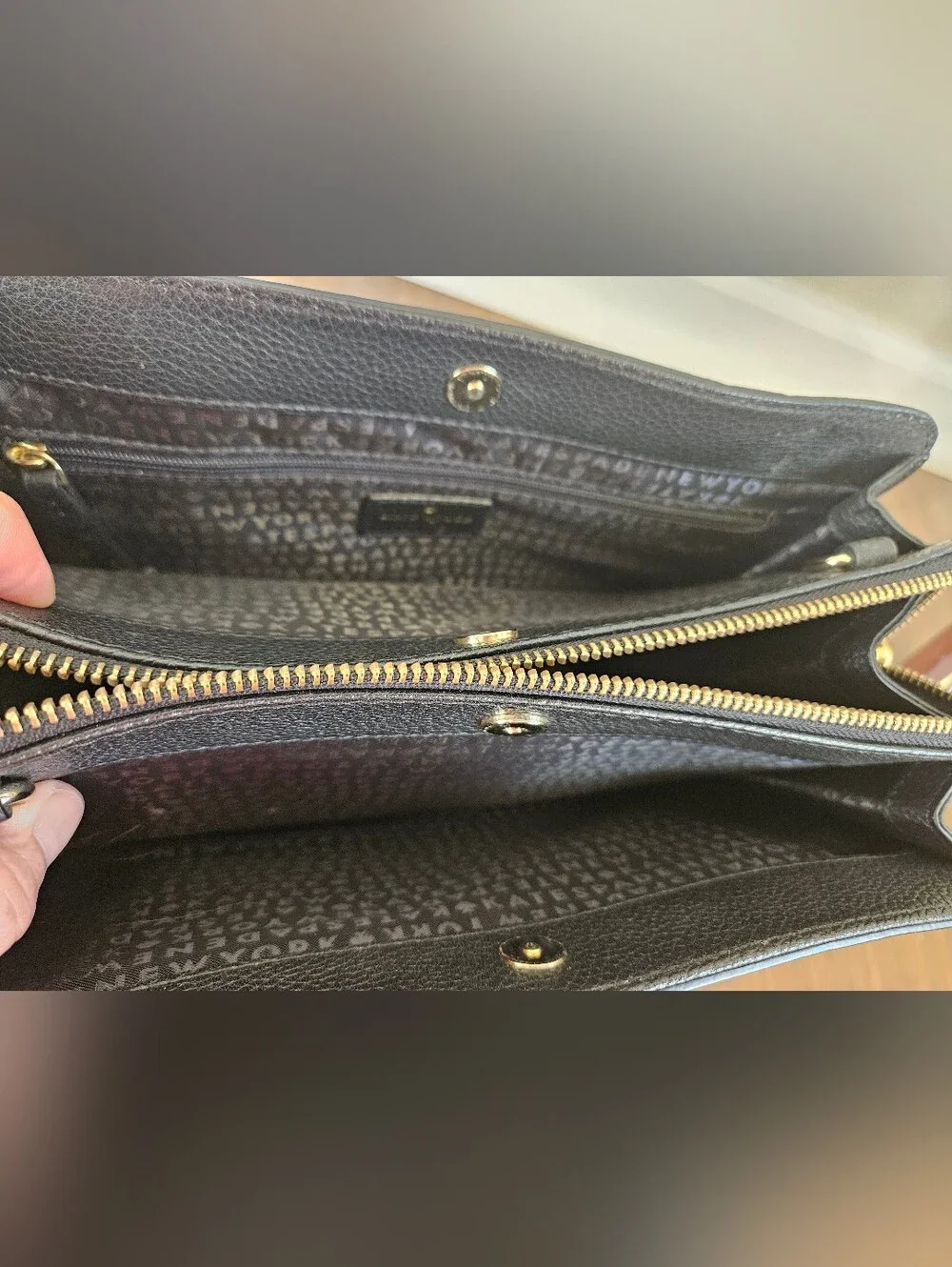 kate spade black pebbled leather satchel with gold accents